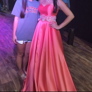 This vibrant coral pageant/ prom dress!!